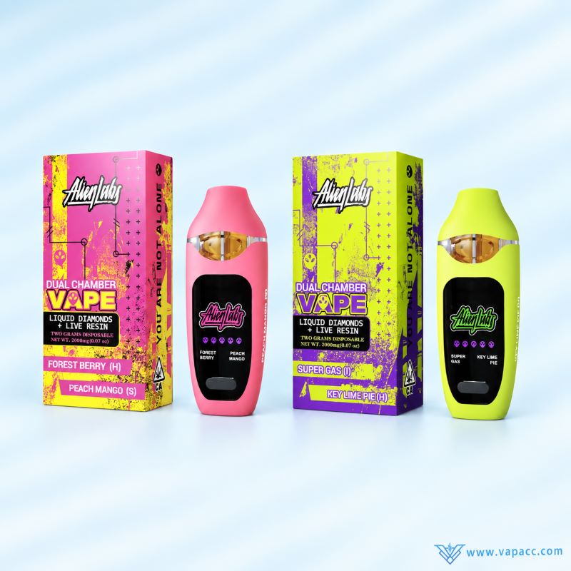 Pink and lime green Alien Labs Dual Flavor empty disposable vape hardware standing beside matching single retail boxes
