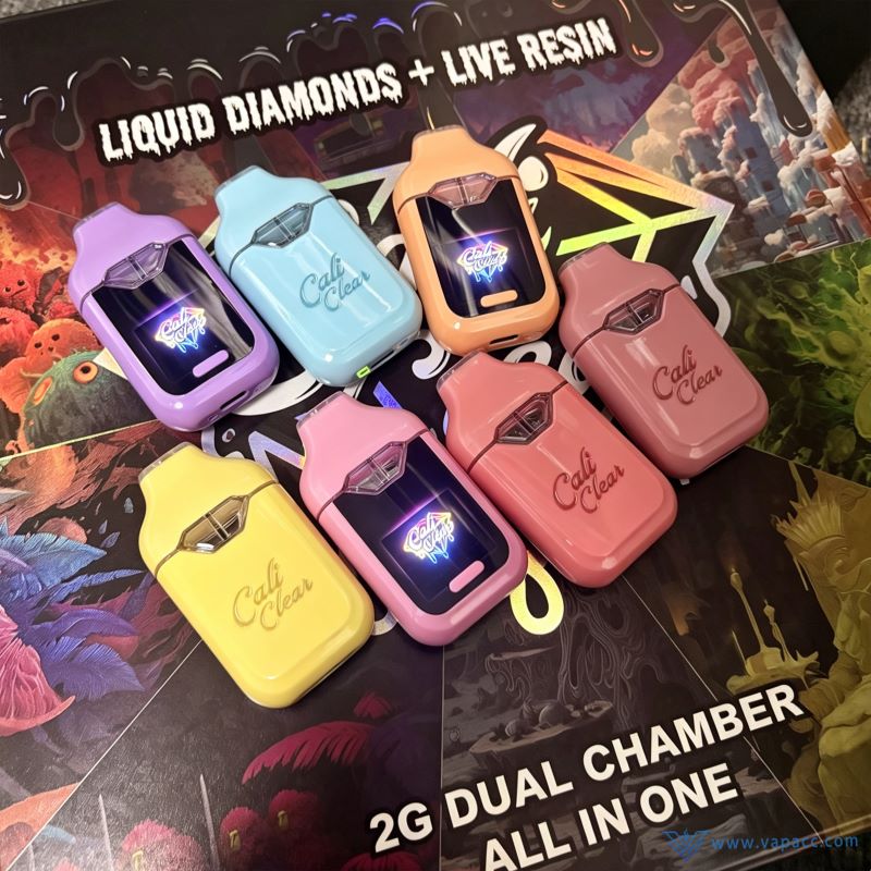 Assorted colorful hardware options for Empty Cali Clear 2g dual chamber vape wholesale with digital screen and dual oil windows.