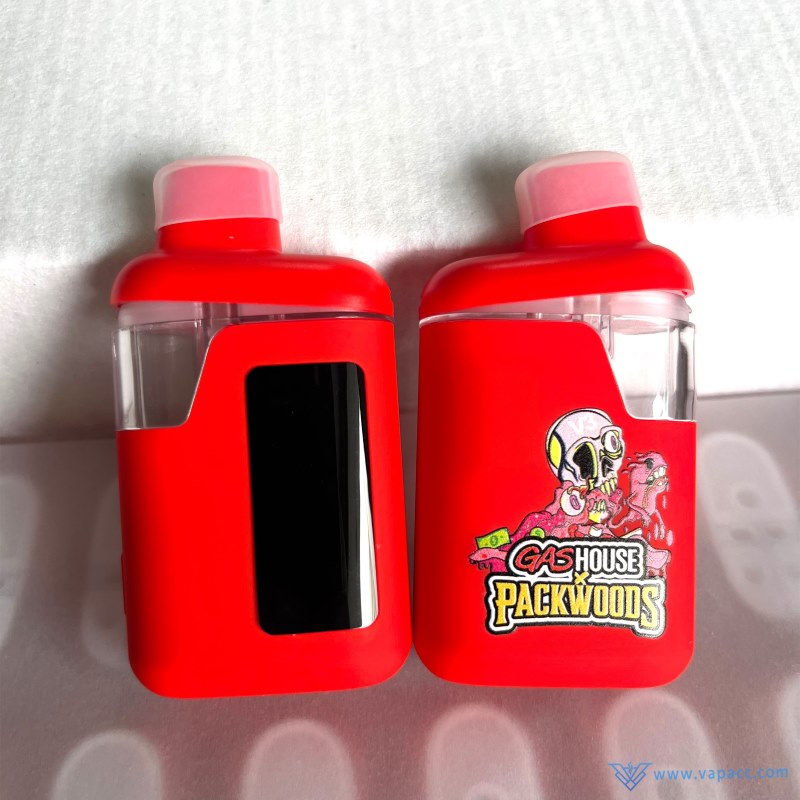 front and back view of red packwoods x gas house v3 dual chamber empty device with screen and logo
