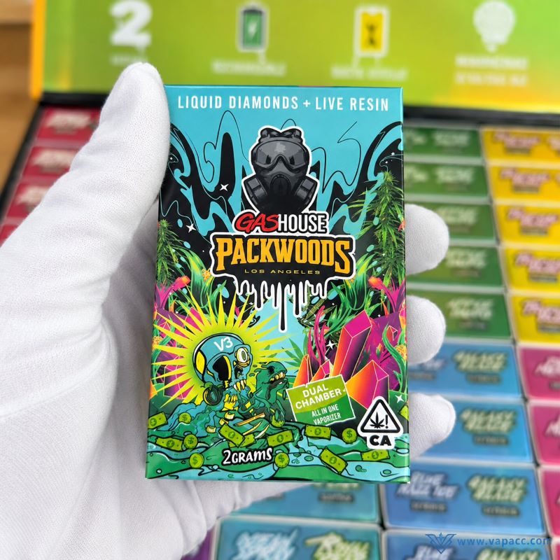 gloved hand holding single unit packwoods x gas house v3 liquid diamonds live resin box