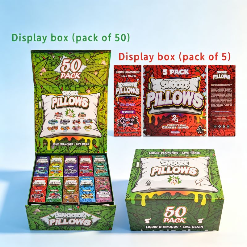Snooze Pillows empty carts wholesale packaging in 5-pack and 50-pack master display boxes.