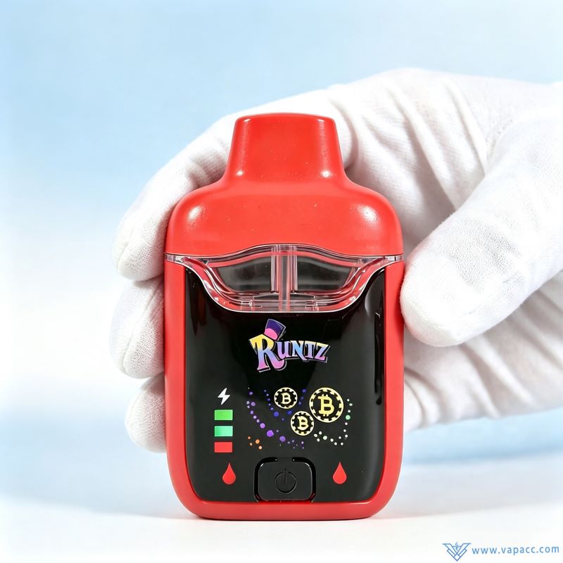 Handheld detail of empty Runtz 2ml dual chamber vape device showing digital screen