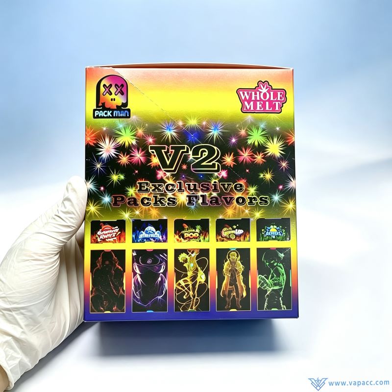 Hand holding Whole Melt Packman V2 exclusive packs flavors wholesale display box
